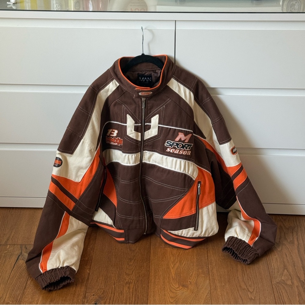 brown, orange, and cream boohooman racing jacket